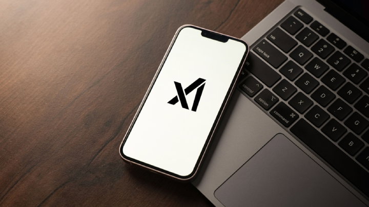 TechDogs-"An Image Showing xAI Logo On A Smartphone"